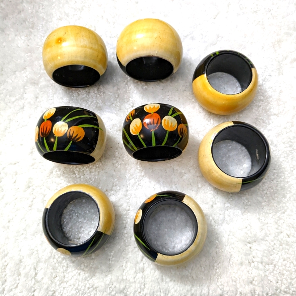 Set of vintage napkin holders. 8 in all. Colorful on the front, solid on back